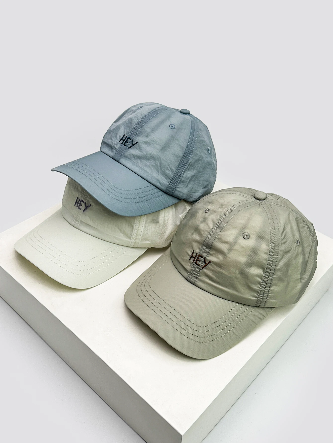 

Spring and summer new letter quick-drying baseball caps, men's and women's sunshades and face-showing small simple peaked caps