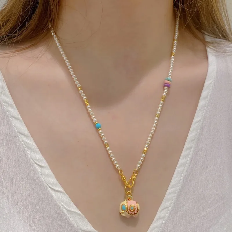 

Sand gold elephant auspicious necklace with no fading, high-end feel, long style, light luxury bead jewelry