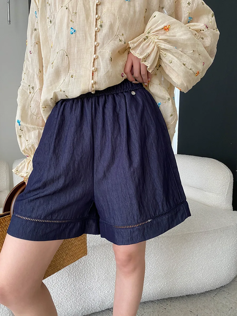 Sommerliche Damen-Shorts in unifarbenem Design mit hohler Textur, elastischem, hohem Bund, schlank machendem und lockerem, weitem Bein. – Detail 33