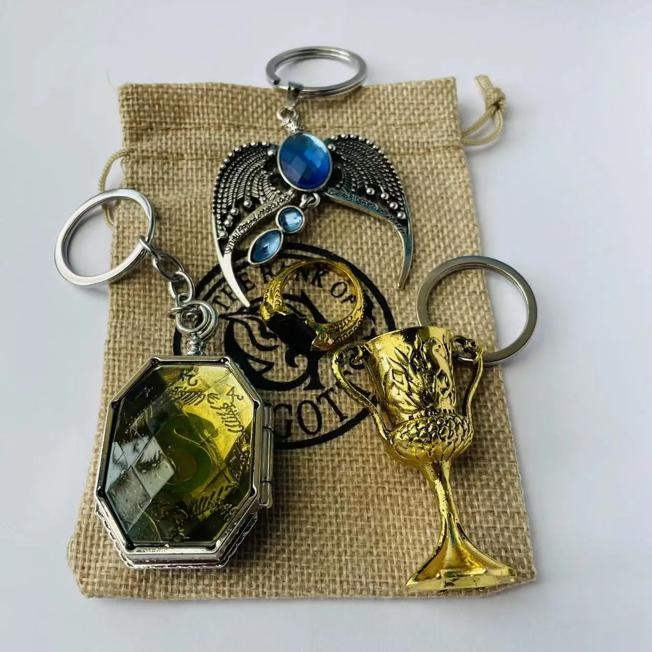 

Horcrux Snake Locket Cup Eagle Pendant Keychain Rings Sack 5pcs Set Goblin Head Printed Bag Halloween Christmas Easter Present