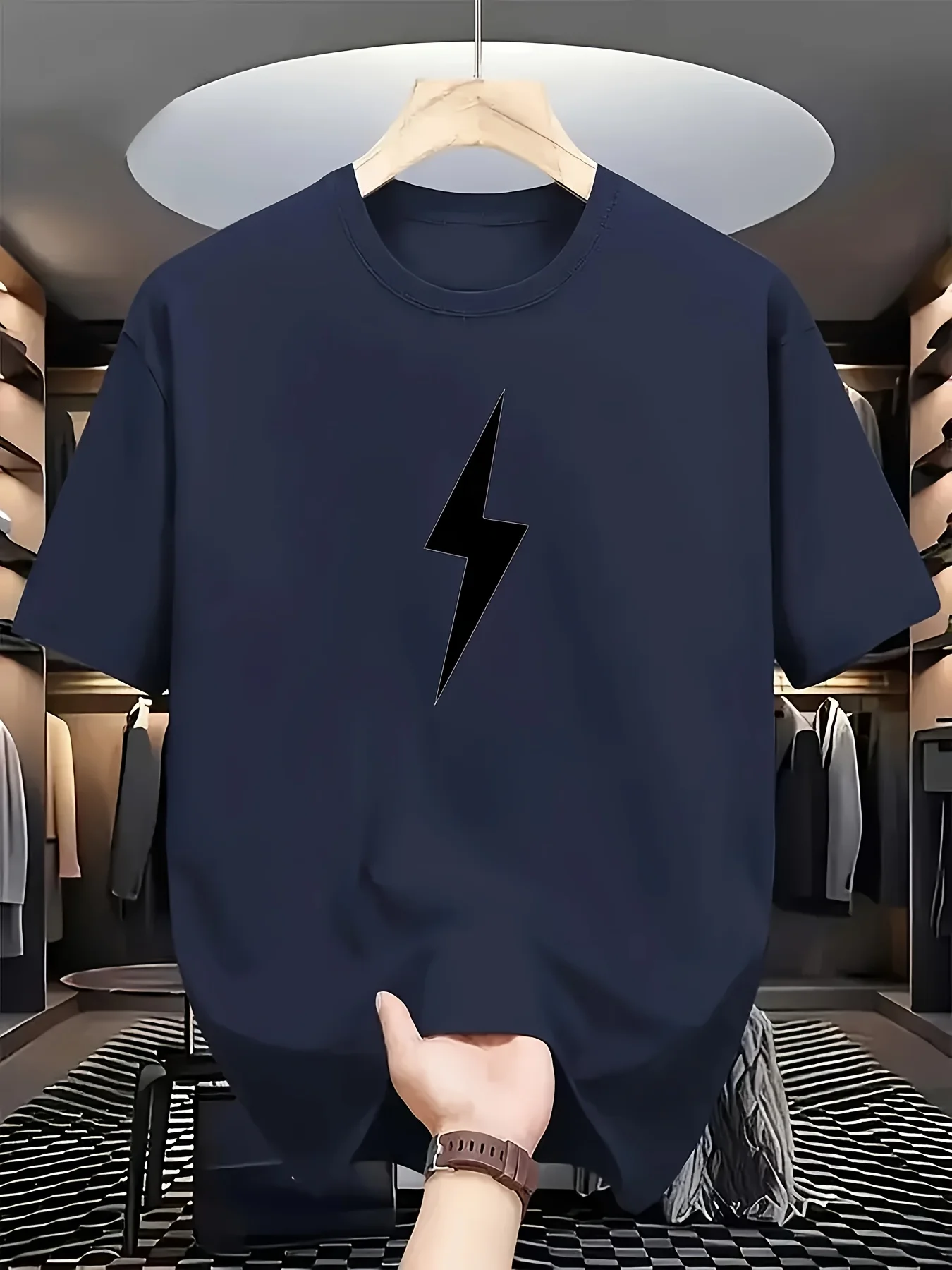 A Round-Neck Short-Sleeve T-Shirt Featuring a Black Lightning Graphic on The Front. Lightning Often Symbolizes Speed, Strengt