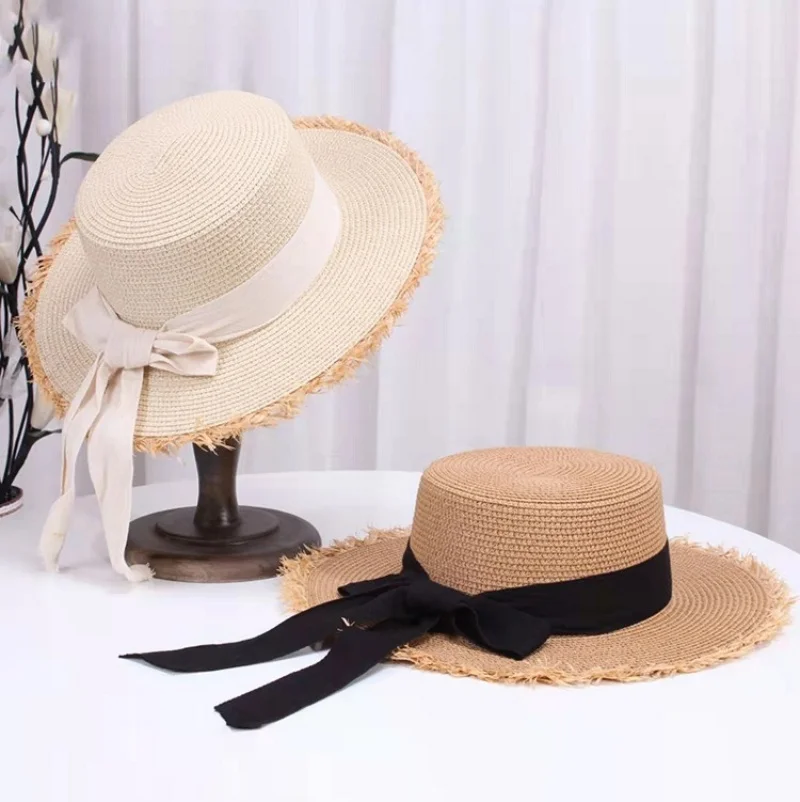 Neuer Sommer-Sonnenschutz, gewebter Damen-Strohhut, Fliege, eleganter Strandhut, Sonnenhut mit großer Krempe für den Urlaub