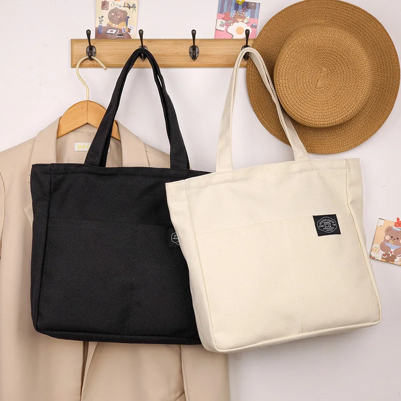 

Korean Version Solid Color Hand-held Sail Bag, Suitable for Commuting and Travel College Style Large Capacity Shoulder Bags