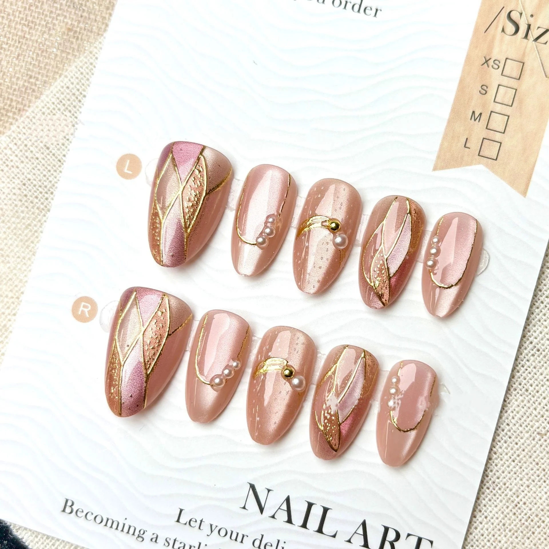 24 Uds. De uñas postizas con lazo dorado y rosa, uñas postizas con diamantes de imitación de ojo de gato rojo, longitud media, almendra, cubierta completa usable, puntas de uñas