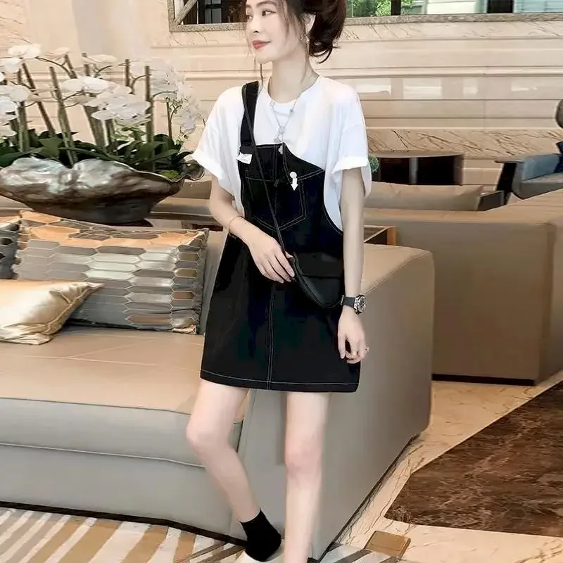 Zwarte denim bandjurk dames Franse casual nep tweedelige T-shirtjurk modeontwerp losse zomertrend dunne oversized jurk