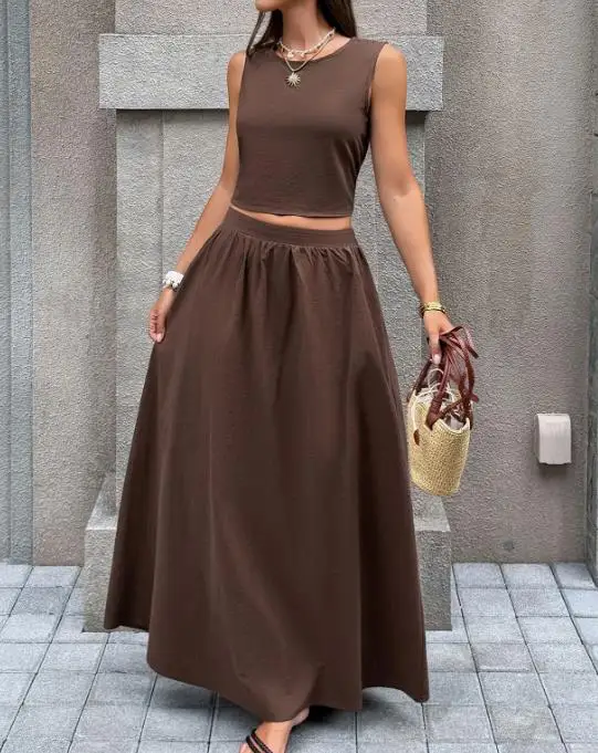 

Women's Two-Piece Set Spring and Summer 2026 Solid Color Casual Vacation Style Sleeveless Backless Top Half Skirt Two-Piece Set