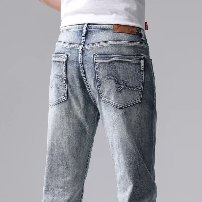 Printemps automne coton hommes bleu mince jean droit affaires décontracté Stretch Denim pantalon mâle marque pantalon ample