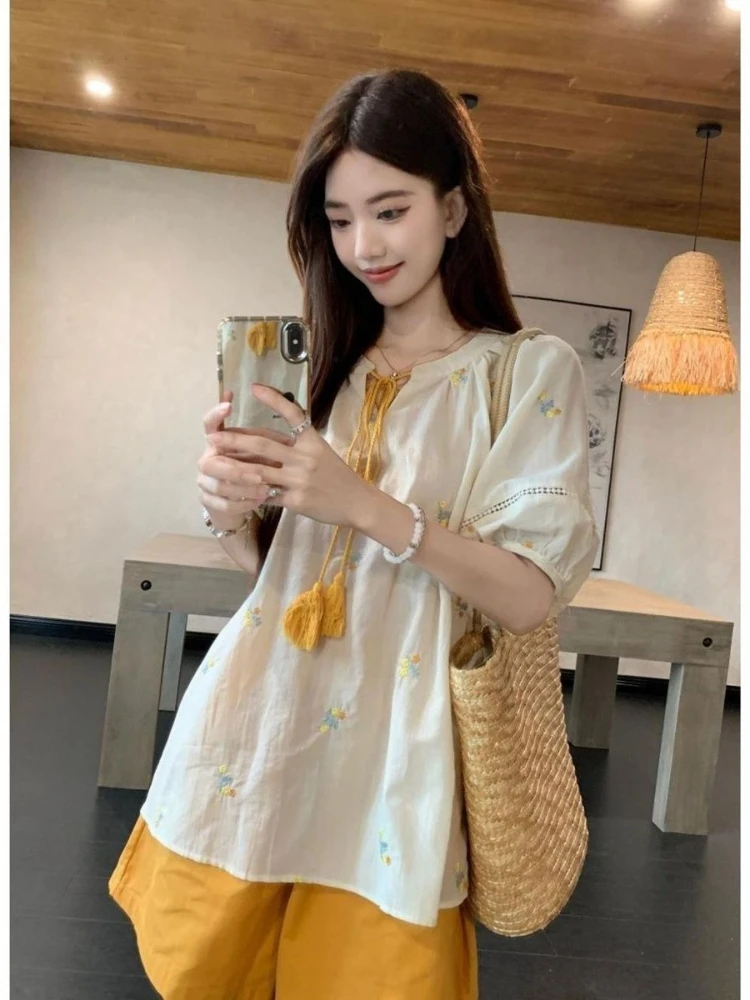 

Korobov Summer Sweet Casual Loose O Neck Short Sleeve Flower Embroidery Drawstring Solid Women Blouse