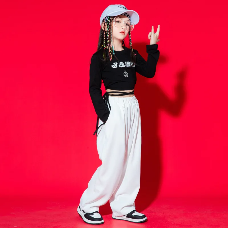 キッズK-POPヒップホップ服 ブラックレースアップクロップトップ 長袖Tシャツ ホワイトカジュアルバギーパンツ 女の子用 ジャズダンスコスチューム服