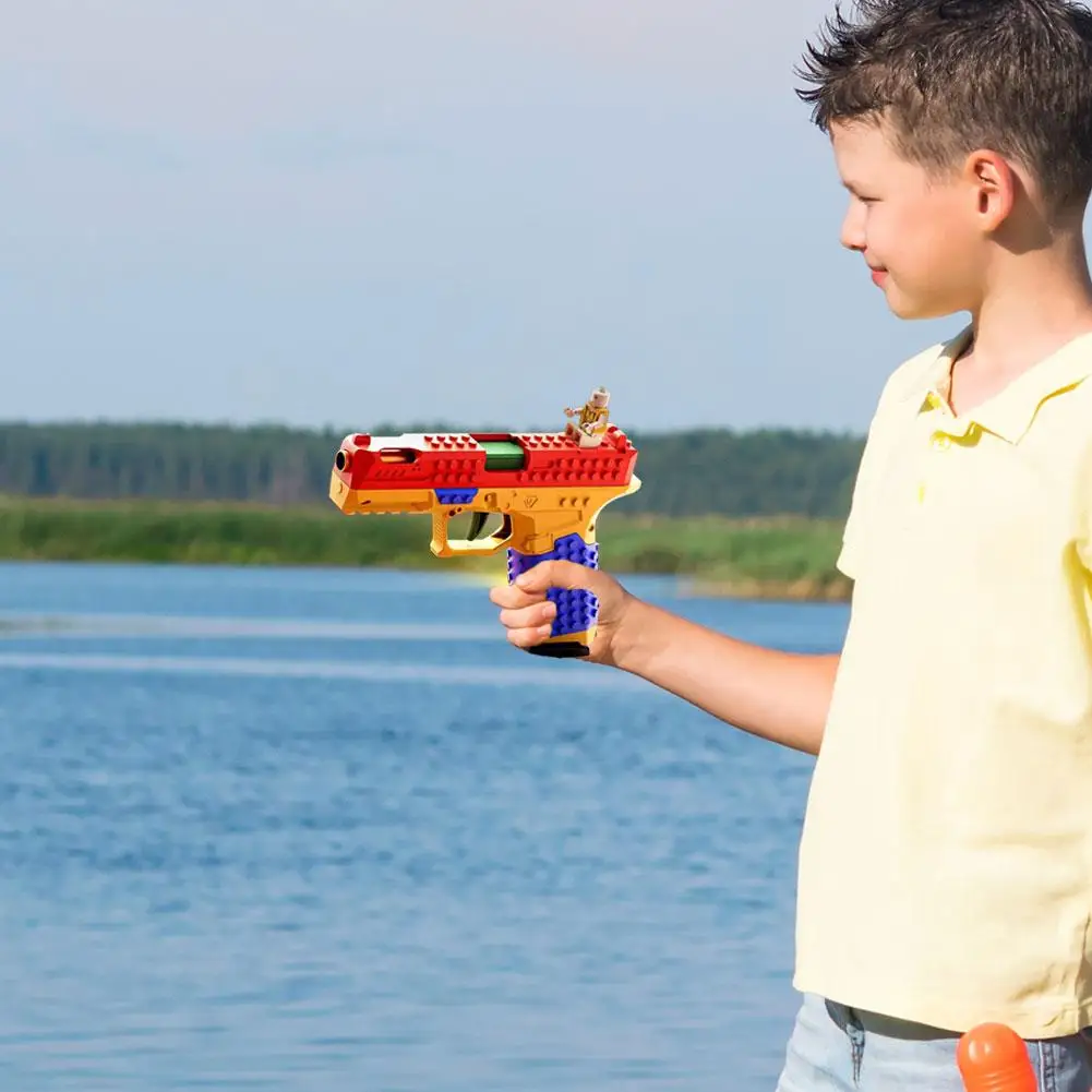 Baustein G17 Glock Spielzeugpistole mit kontinuierlichem Abfeuern und Muschelwerfen Kinderspielzeug Soft Bullet Gun