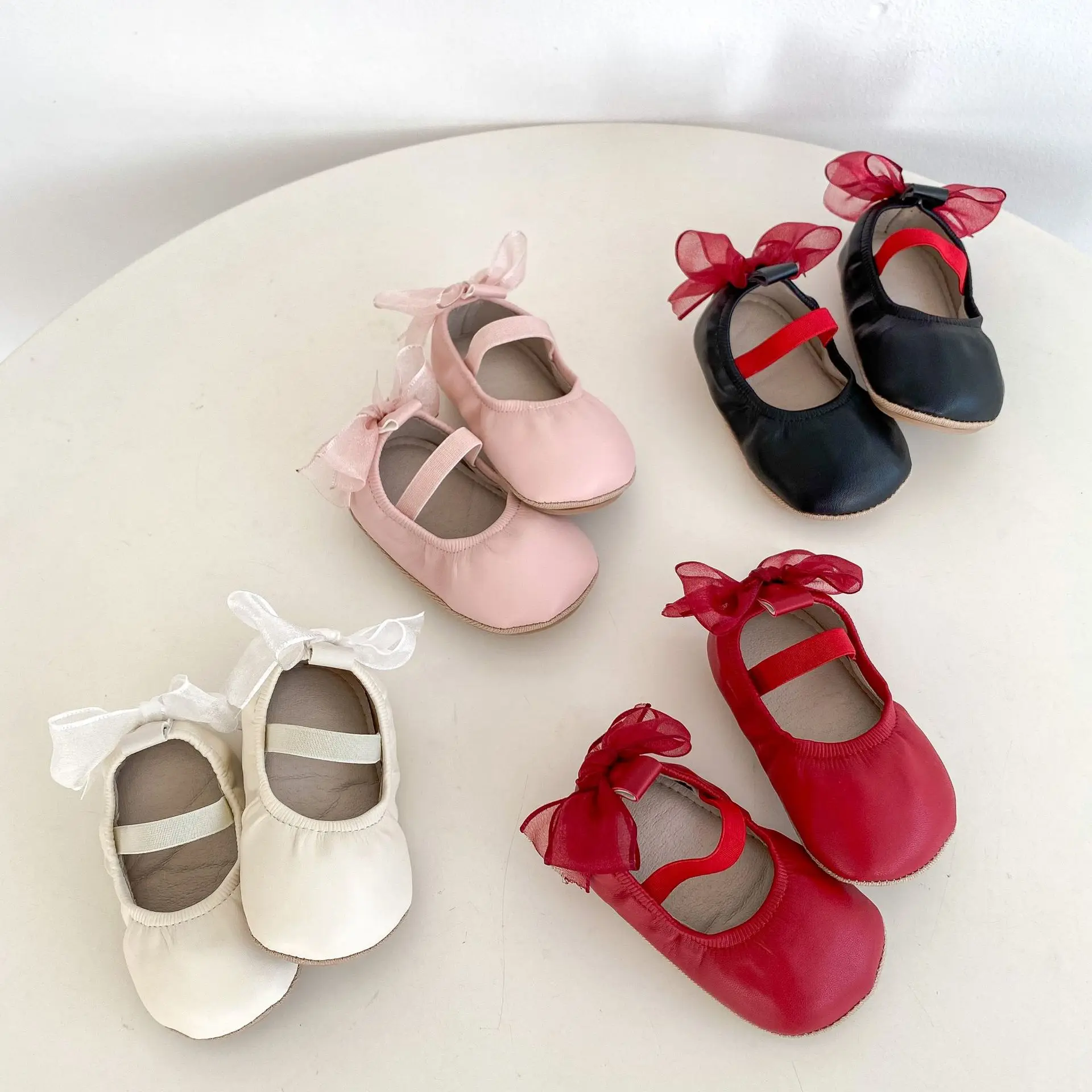 

2026 Spring Baby Girl Ballet Style Shoes with Ribbon Bow Soft Sole Infant Crib Shoes for First Walkers Daily Wear