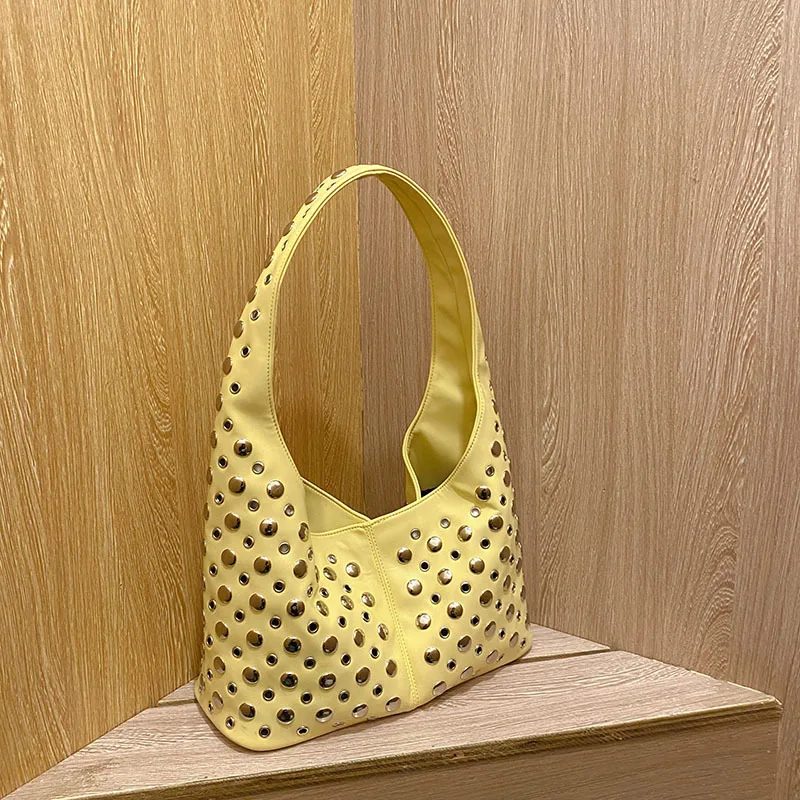 

Round rivet inlaid high-end bucket beautiful women's underarm shoulder bag