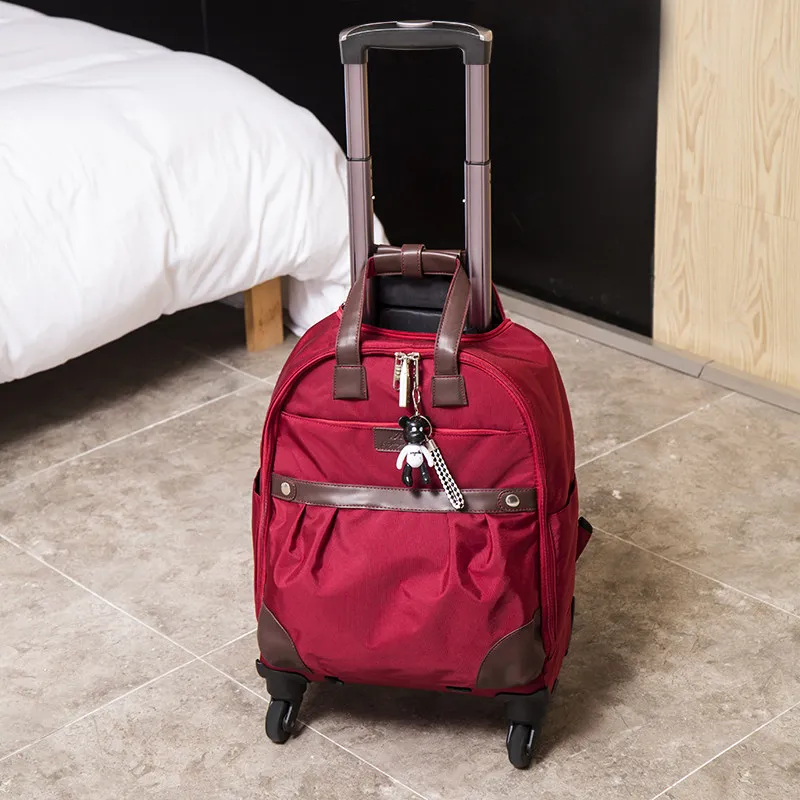 

Spinner Wheel Travel Duffel, Oxford Rolling Luggage, Convertible Backpack – Detachable Caster, Carry/Drag/Shoulder, PU Trim