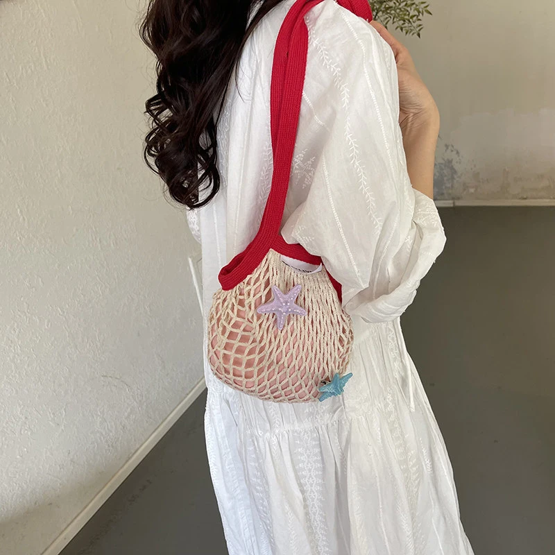 

Korean and Japanese style hollow woven mesh bag for women2026New summer single-shoulder handbag, large-capacity casual crossbody