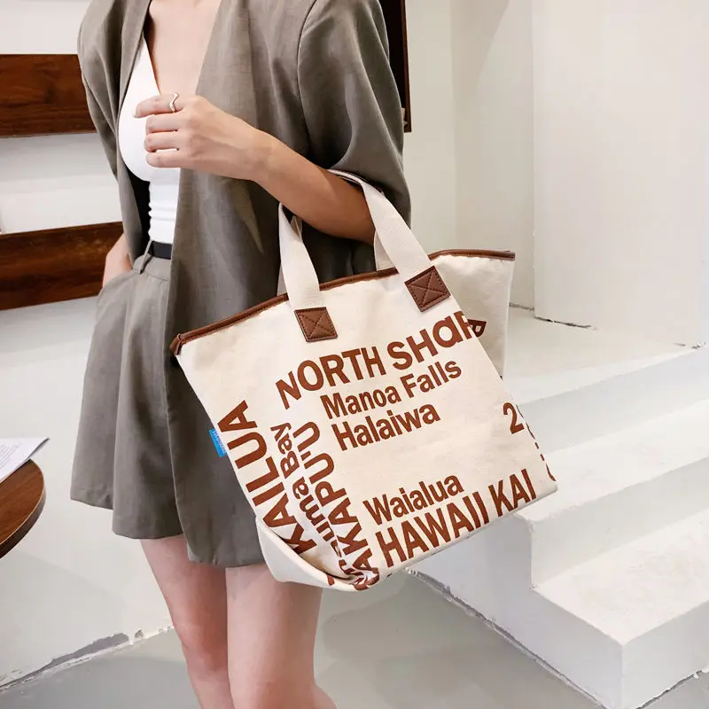 Letter canvas bag women\'s summer large capacity bag 2023 New Korean personality hand-carrying shopping bag shoulder tote bag 가방