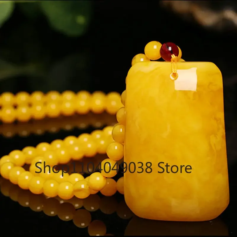 

Natural Beeswax Water Drop Amulet Pendant Simple Delicate Chicken Oil Yellow Raw Stone Amber Necklace Men and Women Holiday Gift