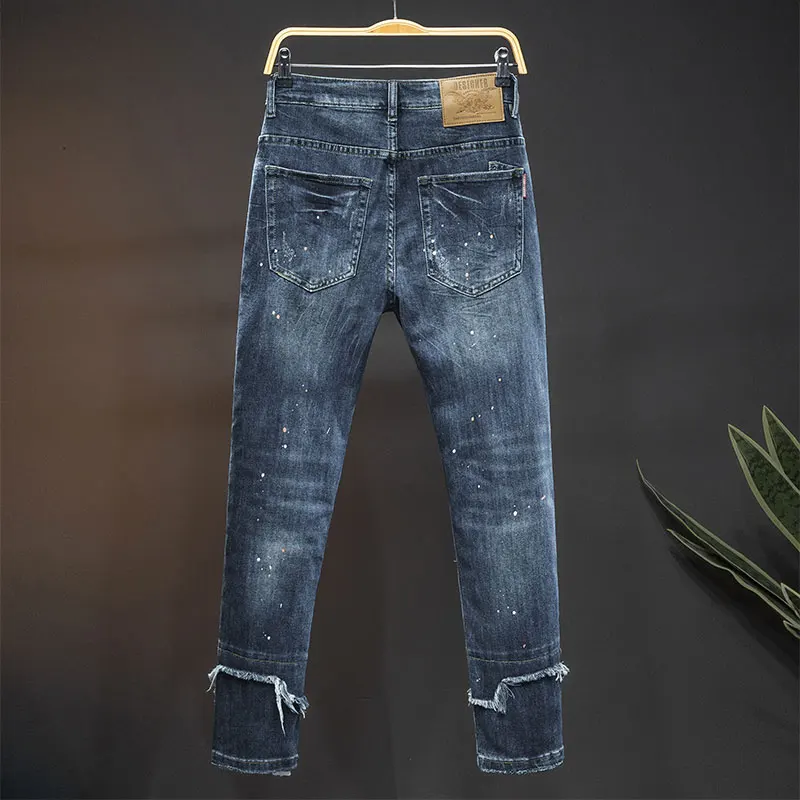 Jeans sobek untuk pria baru 2024 model jalanan kasual desain jahitan elastis slim fit sepeda motor vintage panjang