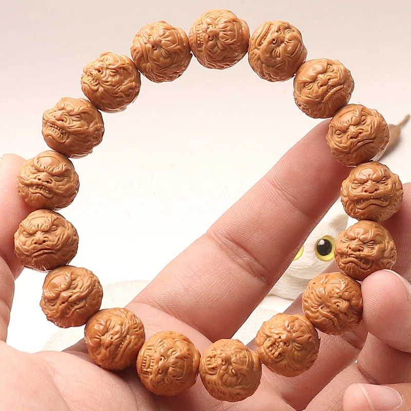 Hand-carved Zhongkui Buddhist beads , natural monkey head walnut cultural toy bracelet, luxurious phoenix feather d