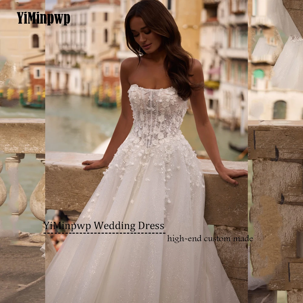 Błyszcząca suknia ślubna bez ramiączek, koronkowe aplikacje, linia A, suknie ślubne z odkrytymi ramionami, tren zamiatający, szyta na miarę 2025 Vestido De Noival