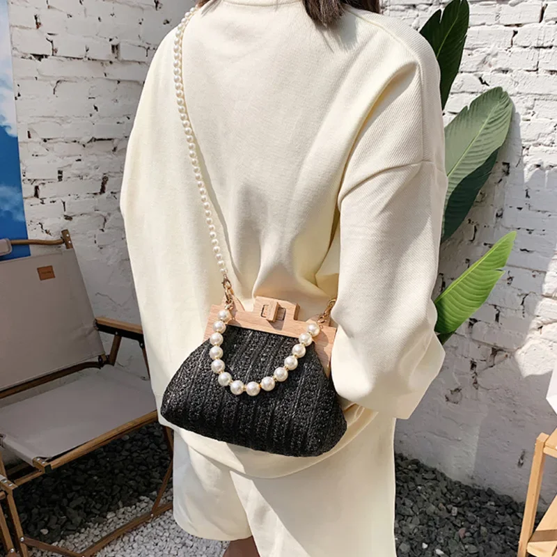 2024 New Women Handbags Straw Woven Pearl Crossbody Bag with Wooden Clip Mouth and Wooden Handle, Niche Woven Handbag