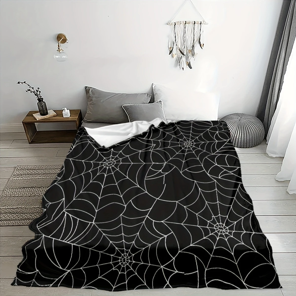 Spiderweb blanket used as seasonal home decor
