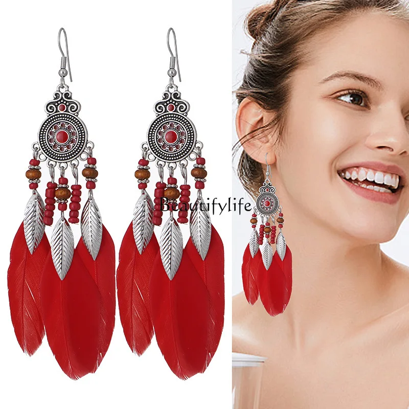 

Feather earrings, round oil drop craft earrings, retro ethnic vacation style