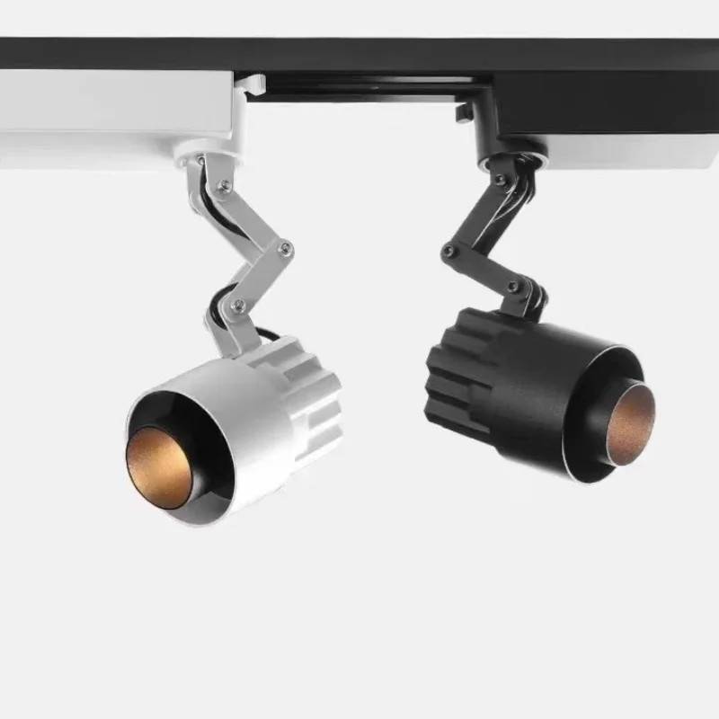 

Embedded/surface mounted ceiling/2-wire track light with mechanical arm that can freely extend, retract, rotate and adjust angle