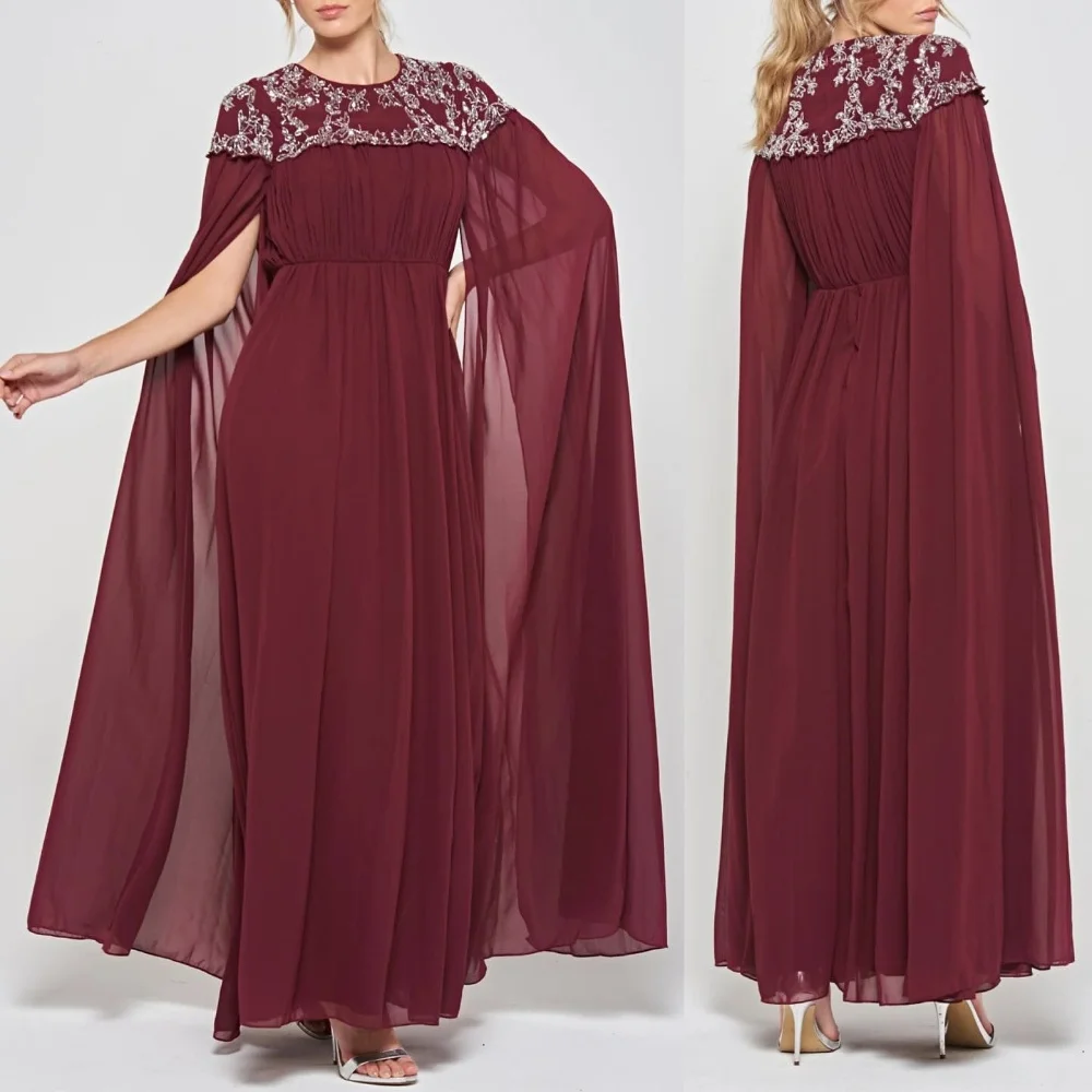 Szyte na miarę, wykwintne, dopasowane sukienki wieczorowe w stylu retro, z szyfonu, z plisami, drapowaniem, aplikacjami, zdobione koralikami i cekinami, o kroju litery A, z dekoltem okrągłym, długie.