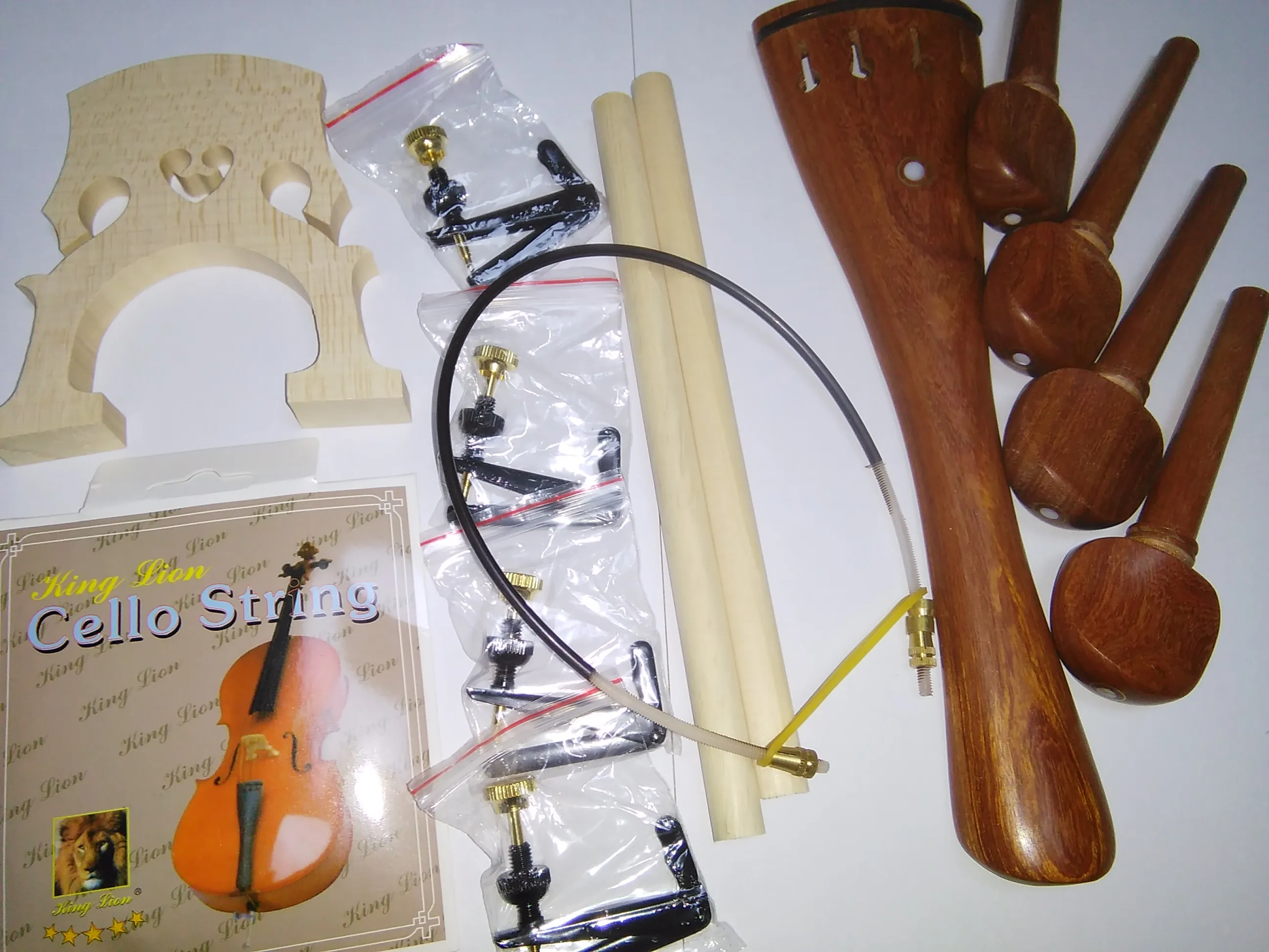 

1 Set Rosewood Cello Parts 4/4 including cello tail piece 4 pcs pegs+2 sound post+4 string adjuster+cello gut etc all 4/4 SF40