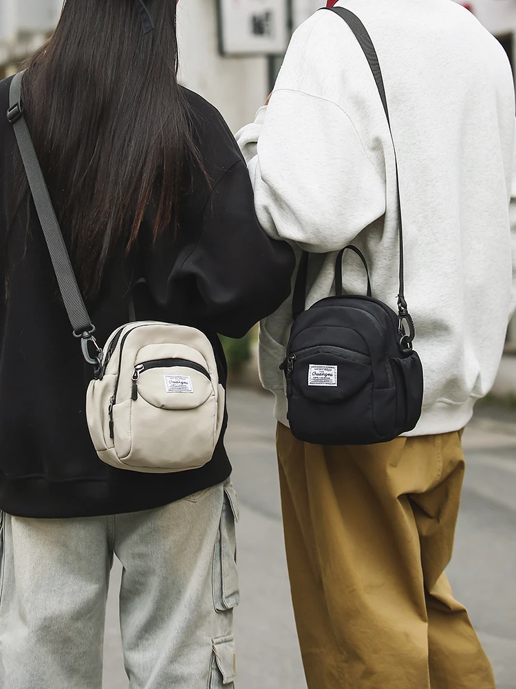 トレンディな多層カジュアルクロスボディバッグ、軽量ハンドバッグ、ストリートスタイル、ファッショナブルな小型ポーチ、男女兼用