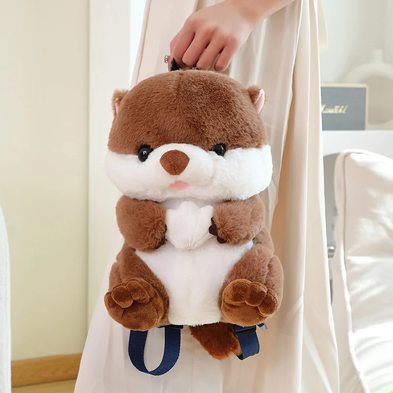 1Pc 28x18x18CM Lovely Otter Plush Backpack Dolls Cute Animal Otter Holding Shell Cartoon Backpack for Birthday Gifts