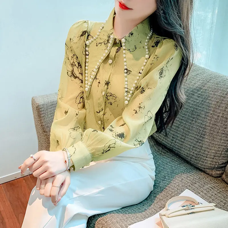 Fashion Printing Spliced Button Beading Shirts Women\'s Clothing 2023 Autumn Winter New Loose All-match Tops Korean Blouses