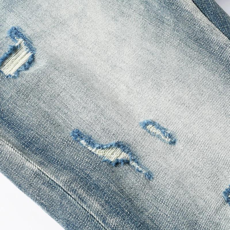 Designer's fashionable new men's jeans with ripped patches, washed nostalgic stretch, slim fit, light blue jeans, hip-hop brand