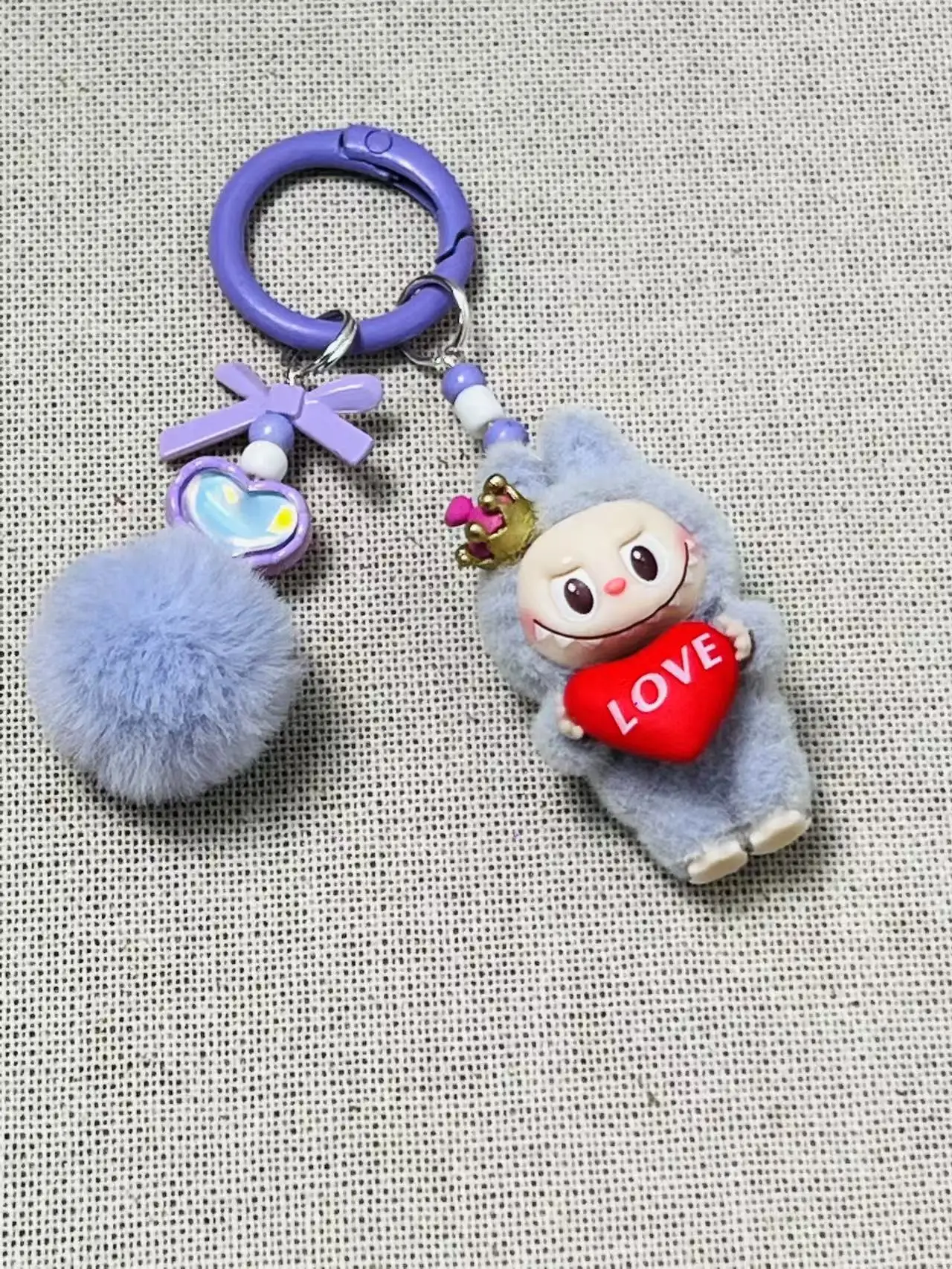 

Kawaii new Labubu keychain cartoon cell phone pendant bag pendant car keychain ornament children's day gift