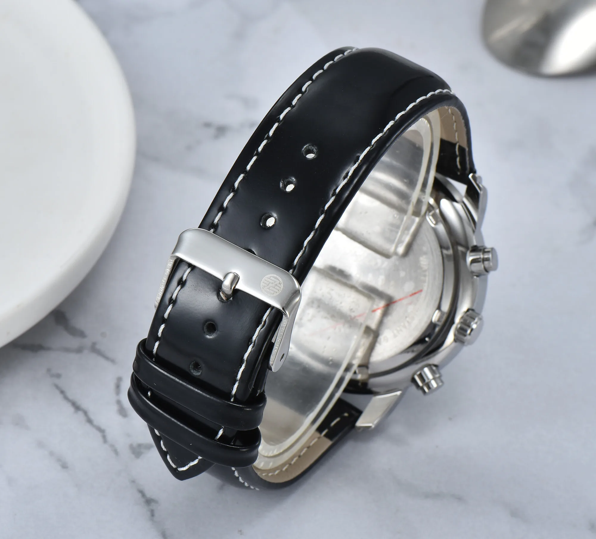 Montre à quartz de luxe pour hommes avec bracelet en cuir véritable et montre binoculaire avec lentille saphir de haute qualité
