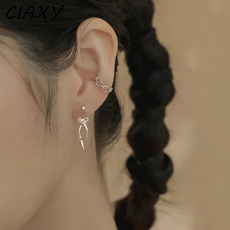 

Женские серьги из серебра 925 пробы с кисточками и бантом