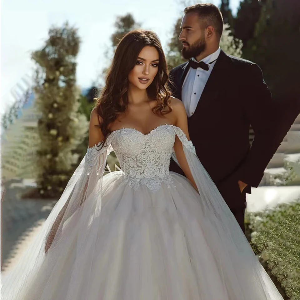 Appliques di pizzo principessa di lusso al largo della spalla una linea abiti da sposa 2023 corte treno Tulle abiti da sposa Plus Size per le donne