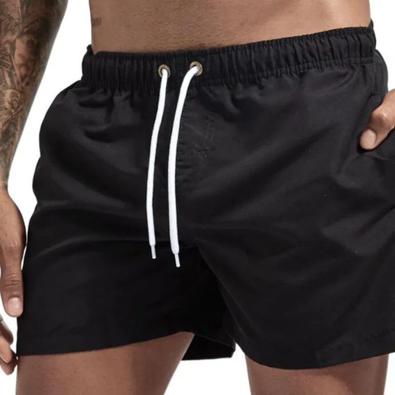 New Summer Mens Beach Shorts Classic Male Casual Fashion Board Shorts Seaside Sport Surfing Solid Color Shorts M-2XL