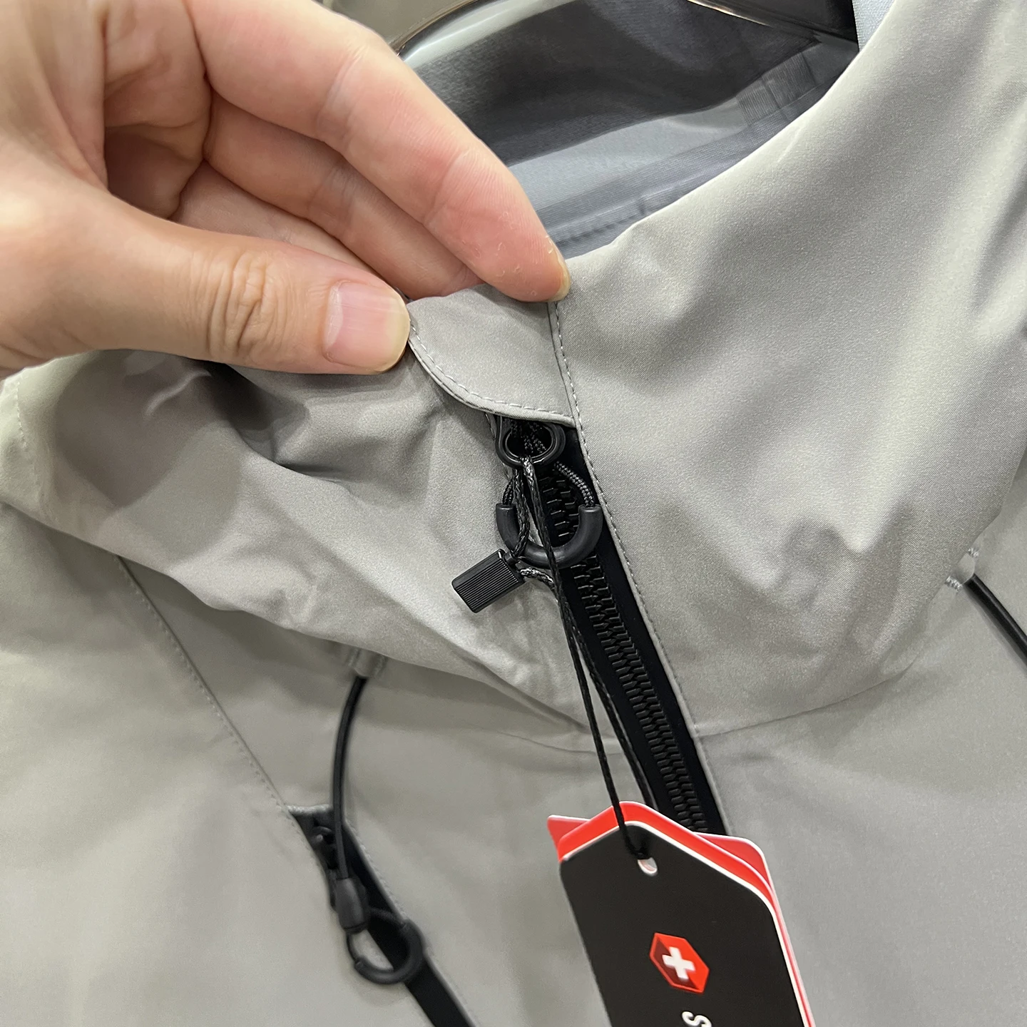 Sl High-End masculino ao ar livre à prova de vento impermeável com capuz Jaet fibra de poliéster longo Sve solto ajuste Sle para o outono