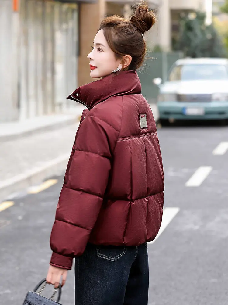 

Thiened ort Coat Women's Winter Faionable New Sle Korean Version Warm Cotton Jaet Stand Collar Zipper Pure Color