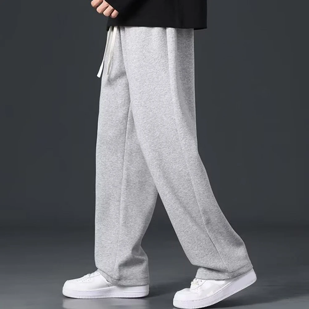 Men Wide Leg Sweatpants Loose Fit Straight Leg Drawstring Casual Solid Color Long Trousers For Sports And Daily Wear