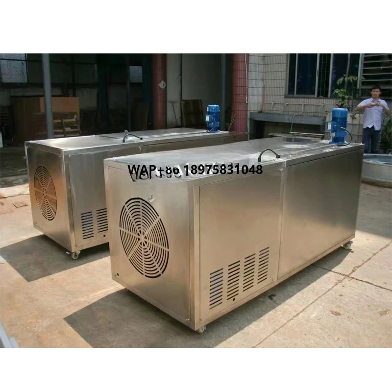 Commercial block ice machine brine ice making system: