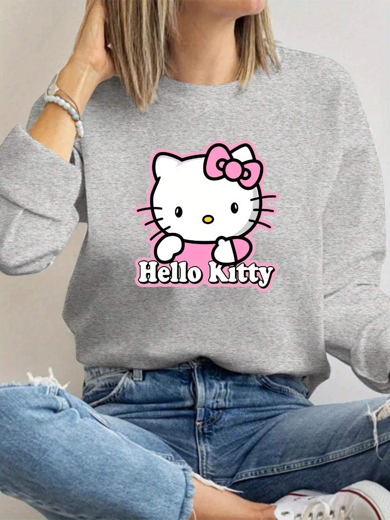 여성용 헬로 키티 그래픽 긴 소매 크루넥 스웨트셔츠 - 아이코닉한 디자인의 소프트 핑크 캐주얼 풀오버