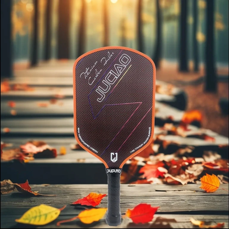 Włókno węglowe Pomarańczowo-tytanowa tkana pianka powierzchniowa Build Edging Unibody Termoformed Pickleball Paddle