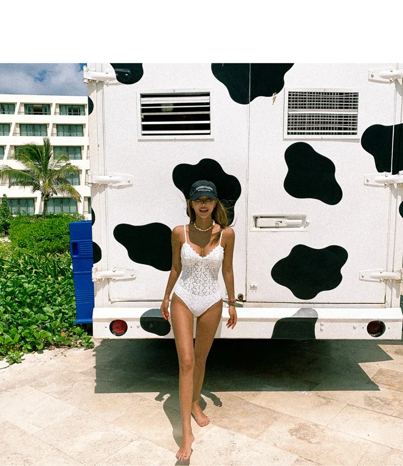 新しい韓国スリムワンピースレースセクシーな水着女性白背中の開いた鋼サポート温泉休暇水着