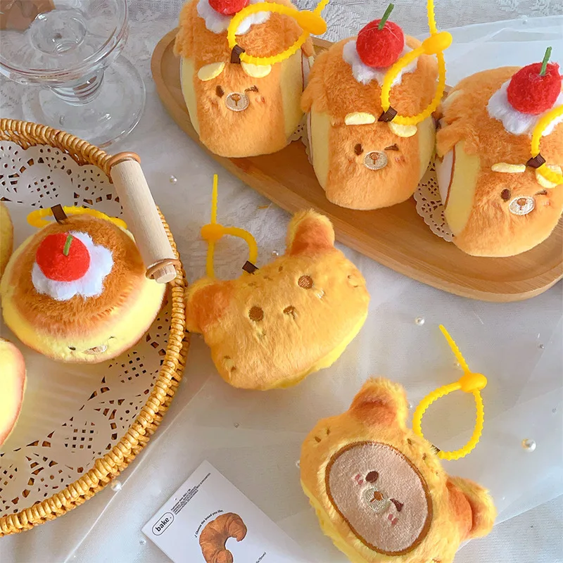 พวงกุญแจตุ๊กตาขนนุ่มรูปเค้กการ์ตูน พวงกุญแจตุ๊กตาพุดดิ้งนุ่มนิ่ม ของตกแต่งกระเป๋าเป้สะพายหลัง ของขวัญสำหรับเด็ก