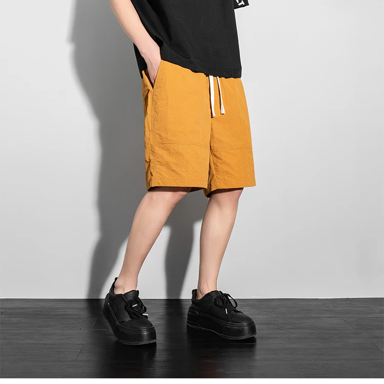 

Летние брендовые мужские спортивные мужские брюки High Street, новые быстросохнущие шорты, повседневные пляжные брюки среднего размера с пятью точками