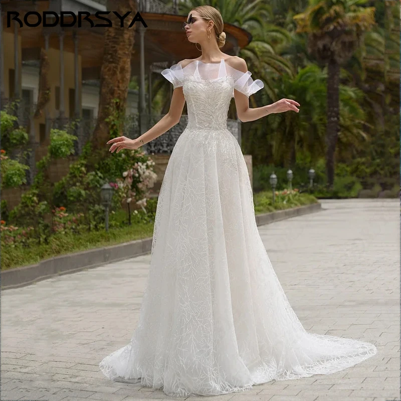 فستان زفاف كلاسيكي بأكمام قصيرة مكشكش من RODDRSYA مطرز بالترتر على شكل حرف a من الدانتيل Vestidos De Novia ذيل محكمة بسحّاب خلفي 2024 مطرز بالترتر على شكل حرف a من الدانتيل Vestidos De Novia ذيل محكمة بسحّاب خلفي 2024