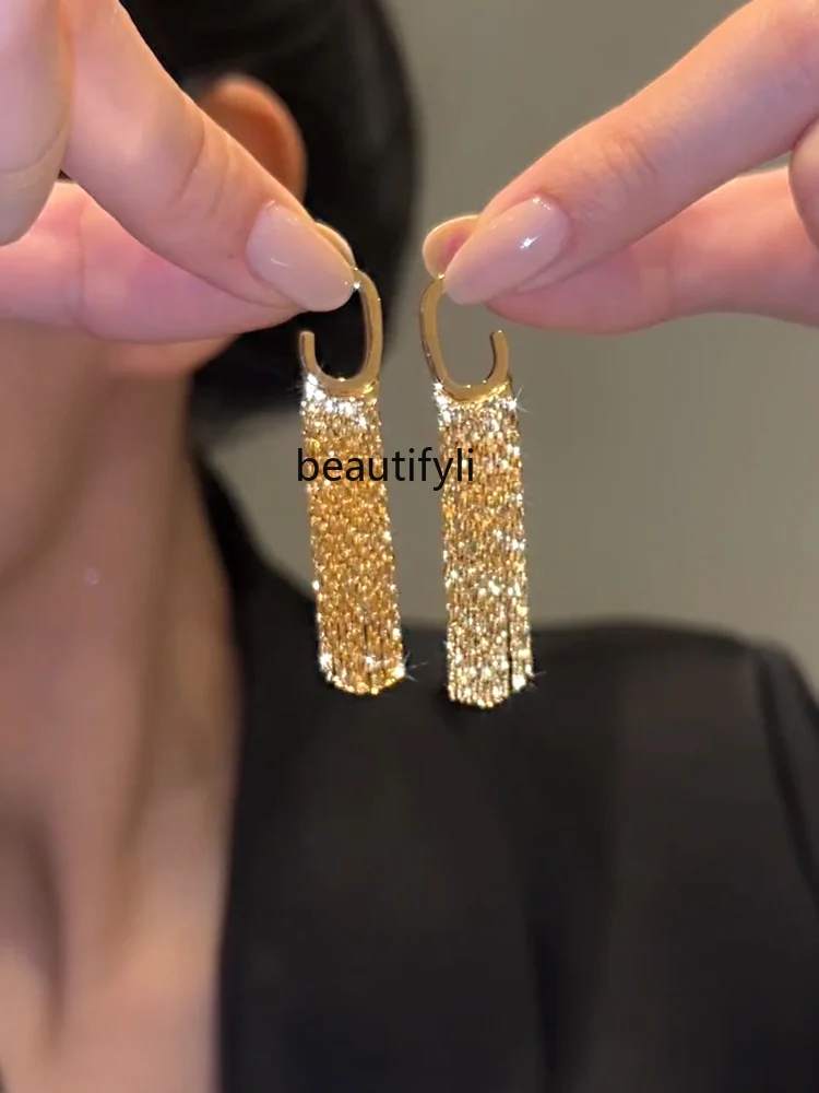 Korean gold long fringed earrings, high-end versatile earrings, light luxury and simple earrings.