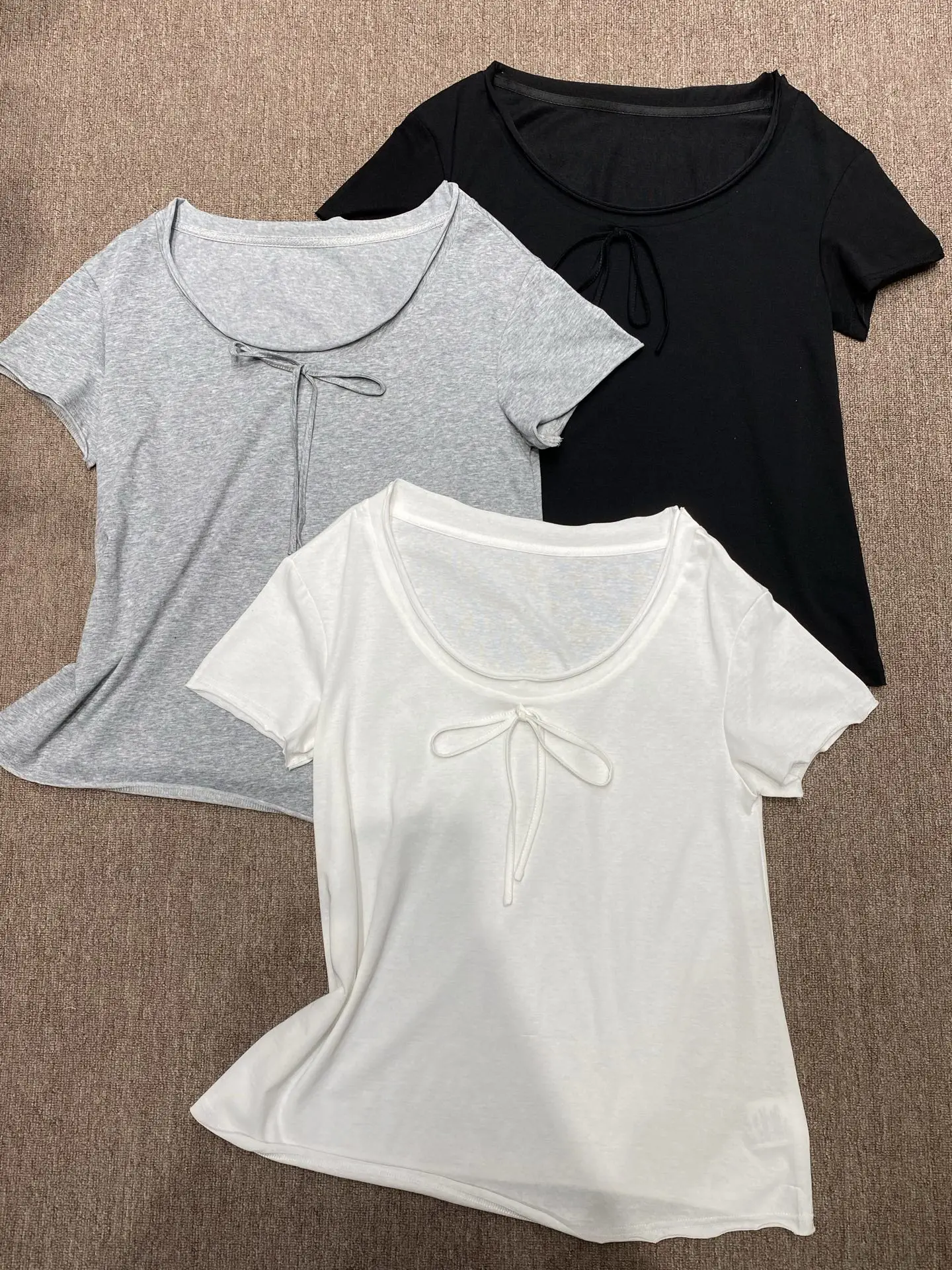 

Sweet Pure Desire Loose Fit Women's T-Shirt with Knot Short Sleeve Asymmetrical Shoulder Design Cotton Casual Top